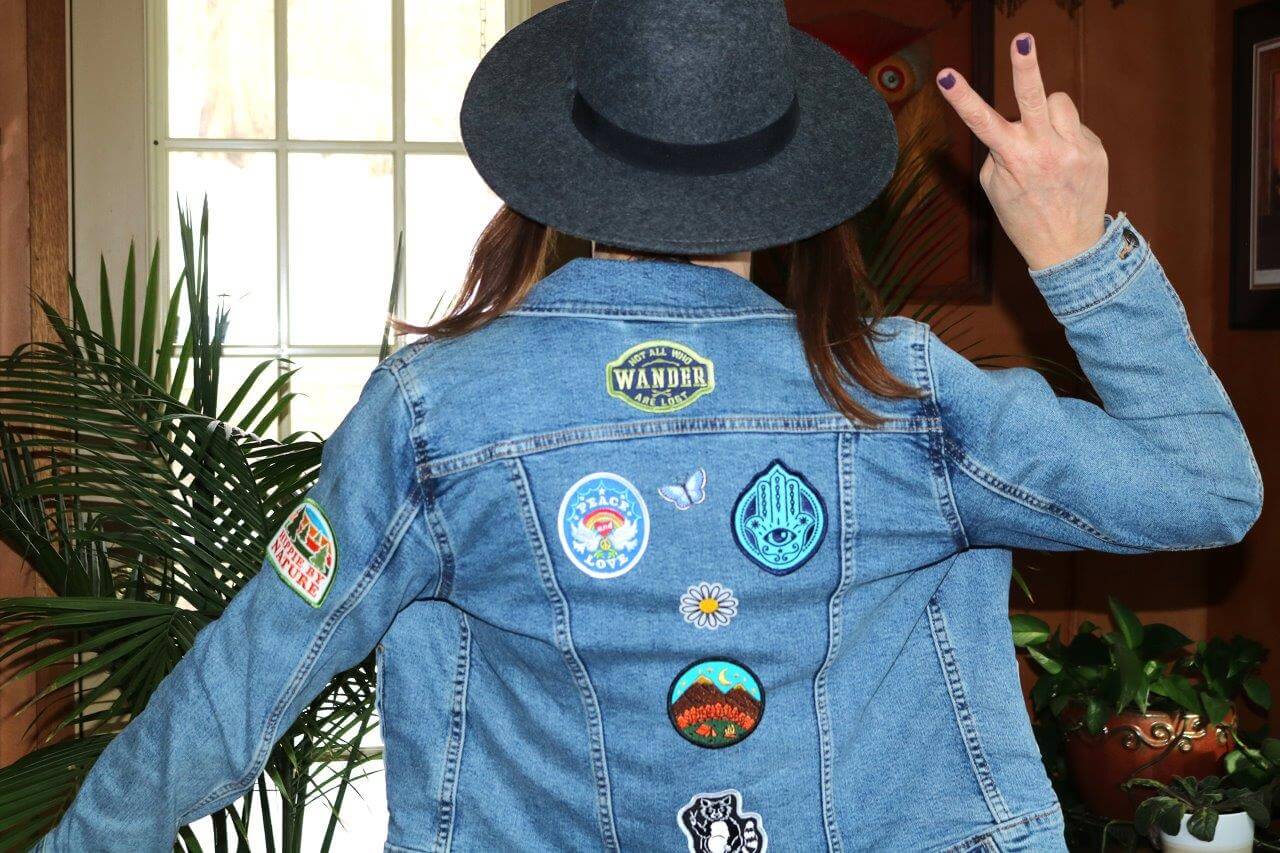 Girl in jean jacket with patches
