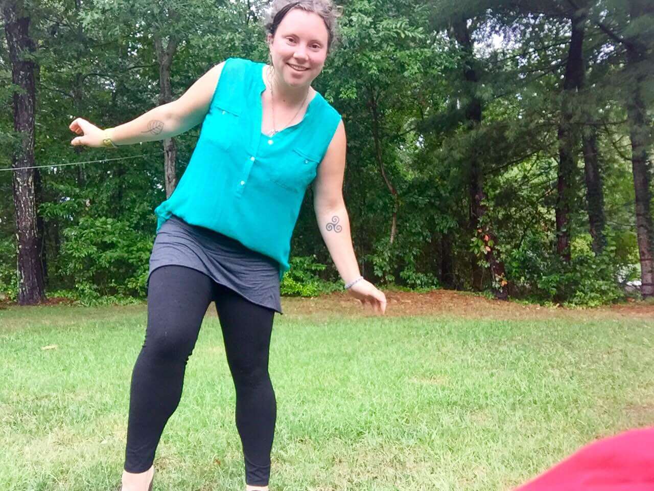 A person in a funky teal sleeveless top balances on one leg on a grassy lawn, with trees in the background. Soul Flower Blog: Hippie Style & Kind Living