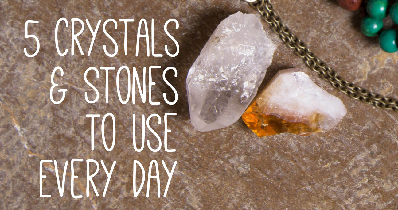 Two crystals and a chain rest on a stone surface, with the text "5 Crystals & Stones to Use Every Day" displayed on the left. Soul Flower Blog: Hippie Style & Kind Living
