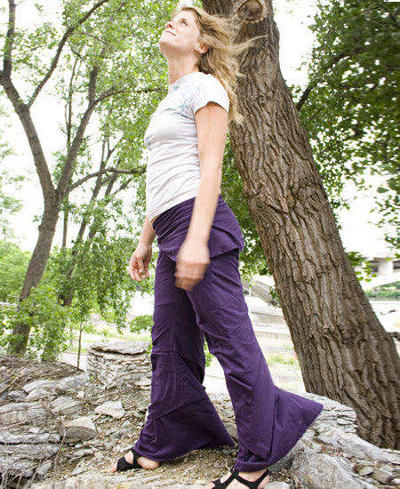 Purple Waves of Freedom boho pants styled on a model outdoors