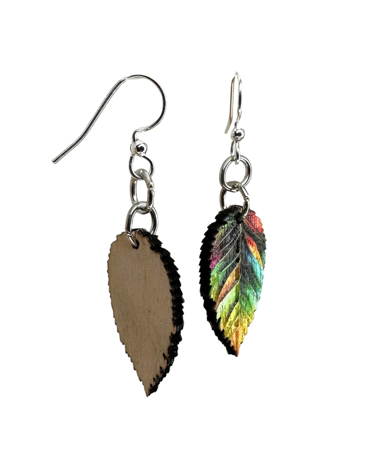 A pair of dangling leaf earrings with silver-toned fishhook wires and rings. Color Me Kind Earrings on white Background.