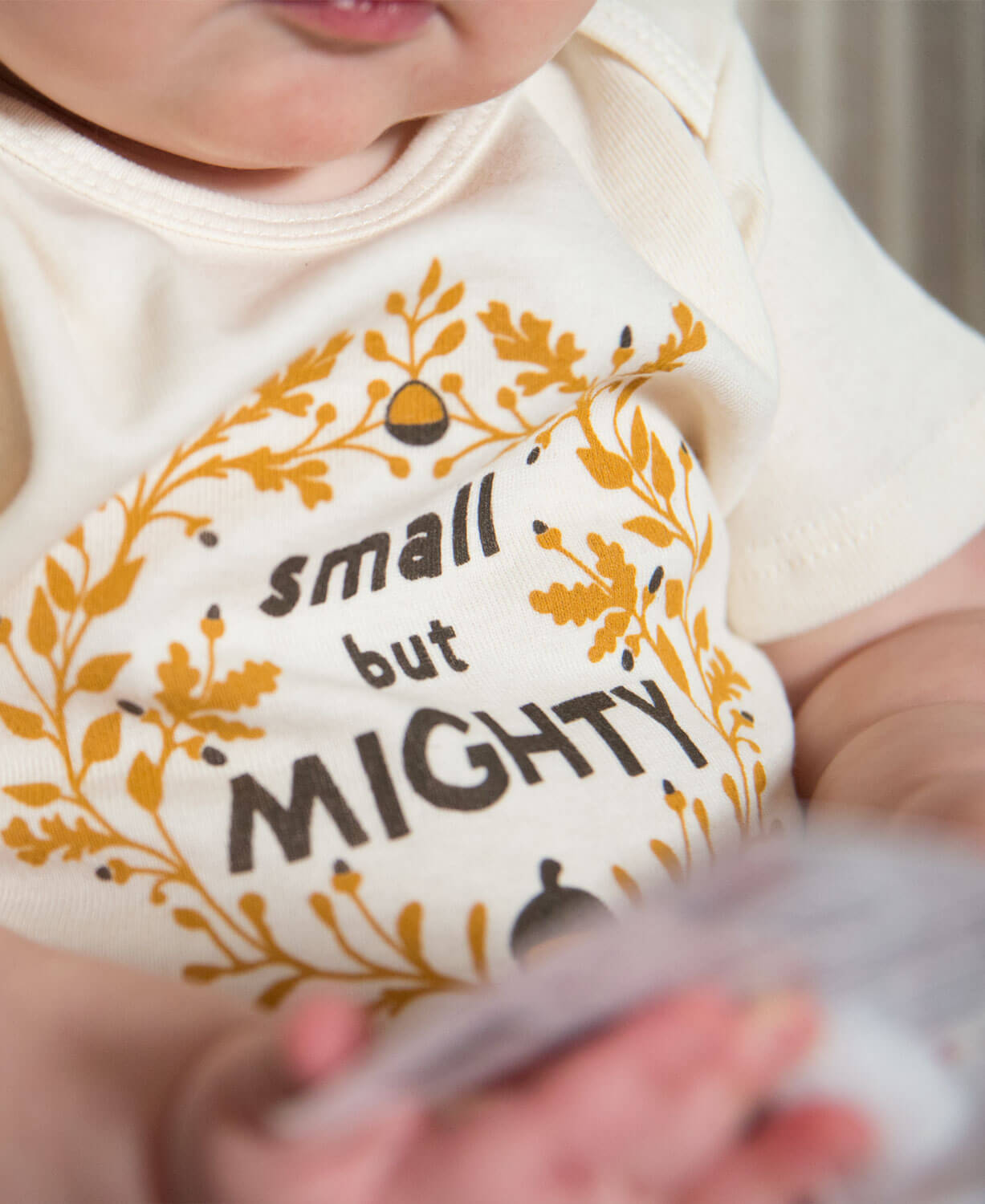 Small But Mighty Organic Baby Bodysuit