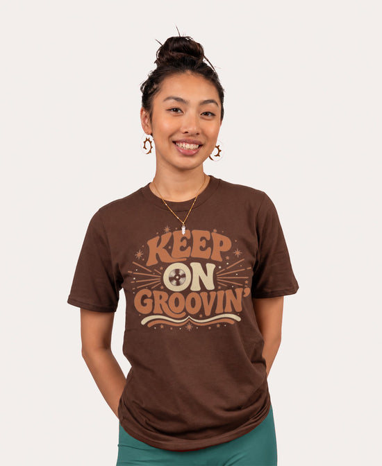 Keep On Groovin' T-Shirt - Brown with keep n Groovin in retro 70s font cream and orange women