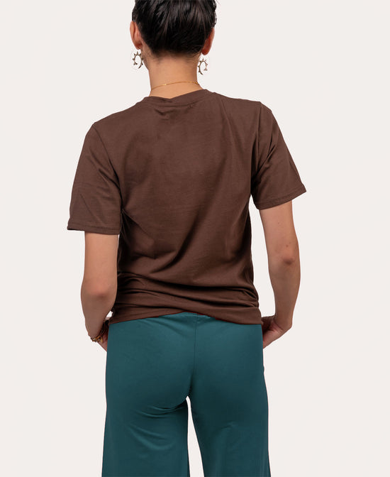Keep On Groovin' T-Shirt - Brown with keep n Groovin in retro 70s font cream and orange women back